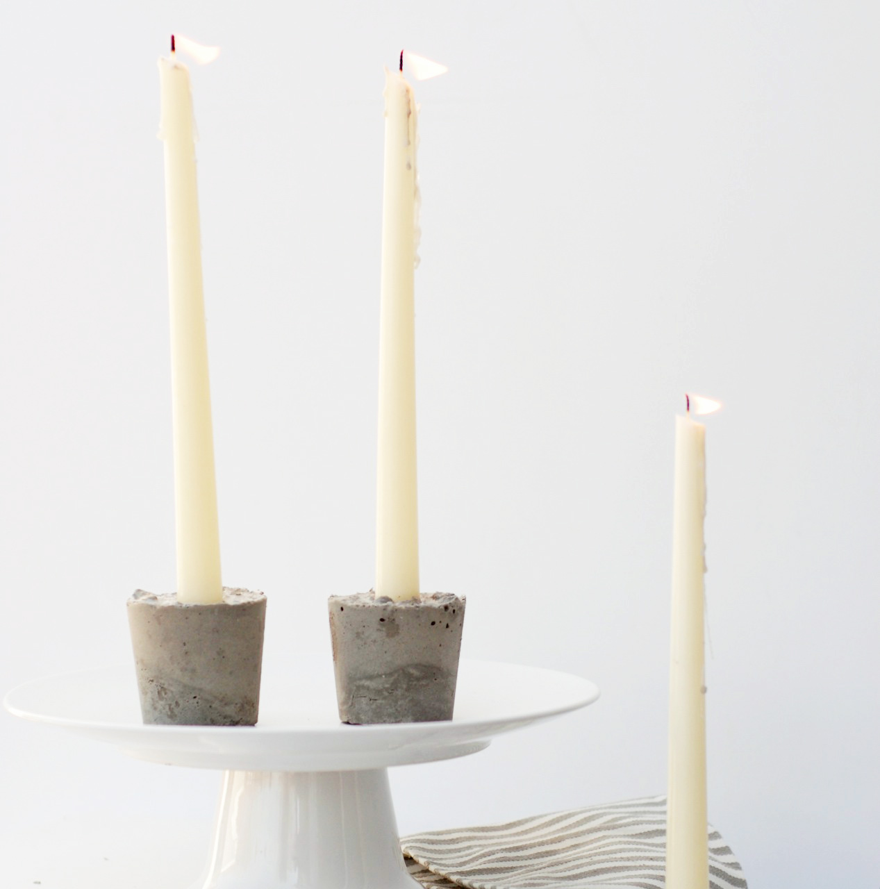 concrete candles • A Subtle Revelry