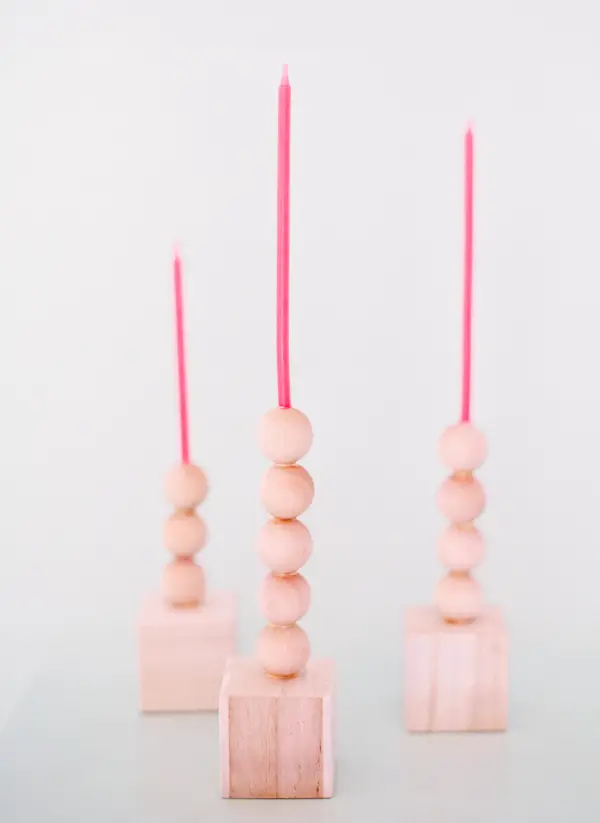 DIY Wooden Ball Candlesticks at asubtlerevelry.com
